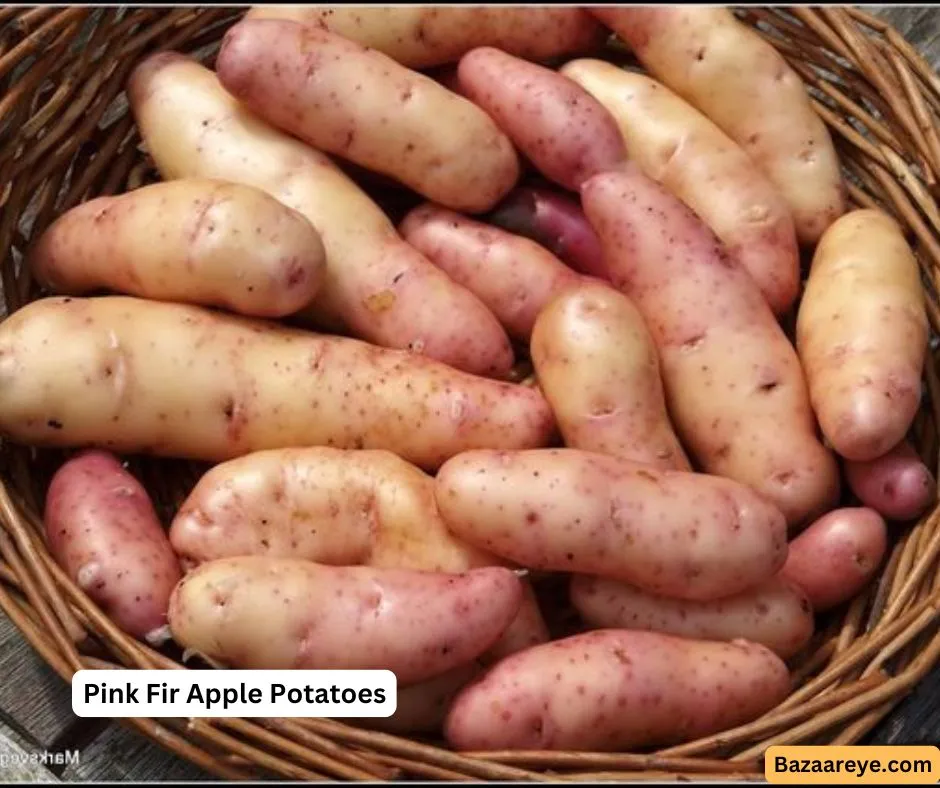 Pink fir apple potatoes placed in a wooden basket